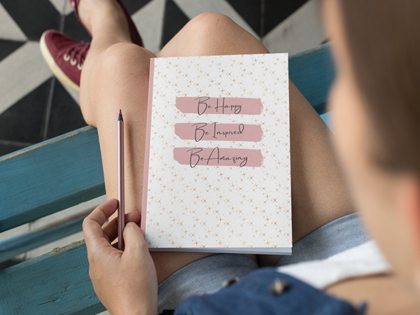 mockup-of-a-woman-with-an-a5-notebook-over-her-lap-29958 (1)